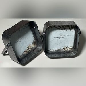 2 metal 4x4 photo frames